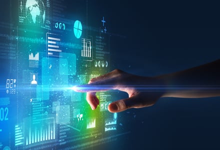 Female finger touching a beam of light surrounded by blue and green data and charts-1